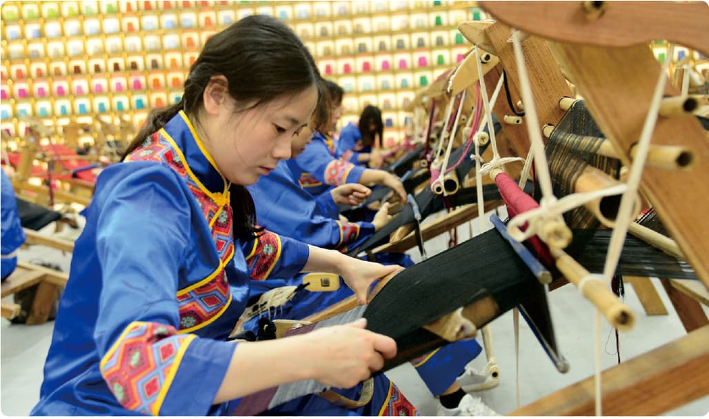 Tujia brocade weaving documented in the official Manual