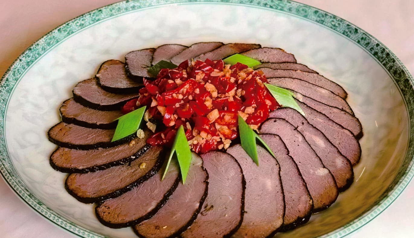 Stir-fried minced pork tripe in the official Tour Guide Manual.