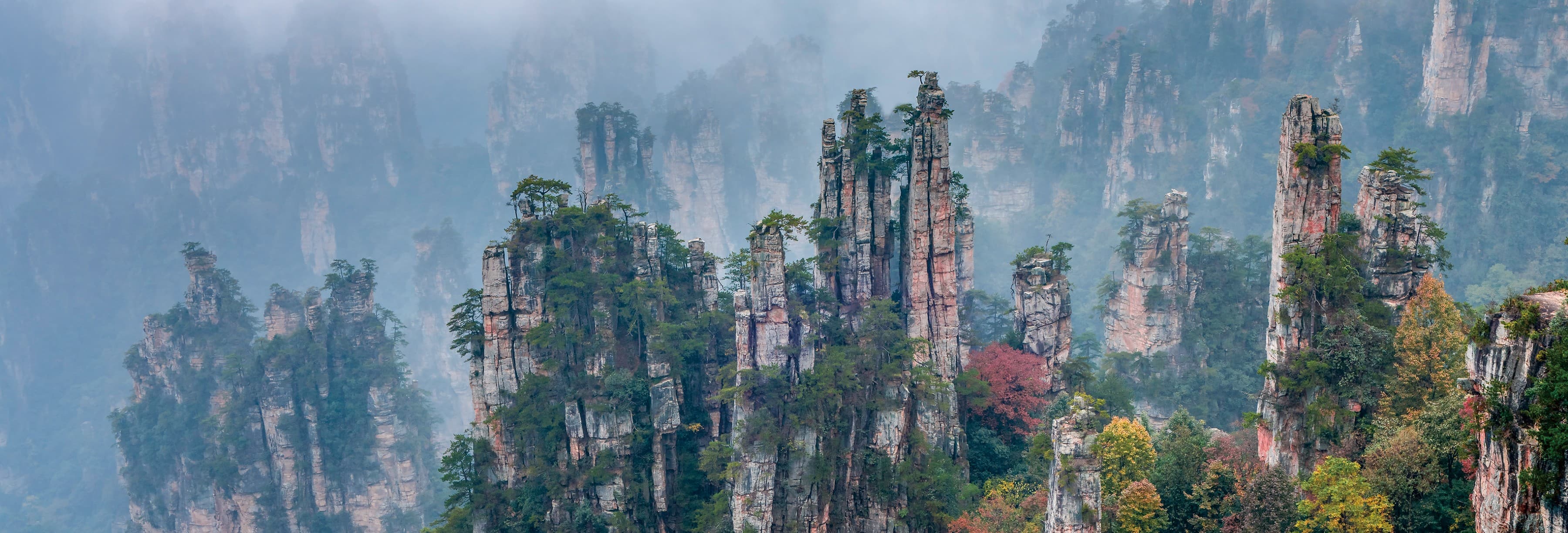 Sandstone pillars in the must-visit scenic areas section of the official Tour Guide Manual