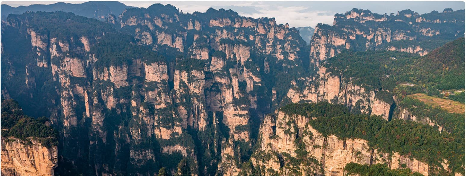 Yuanjiajie sandstone pillars documented in the official Tour Guide Manual